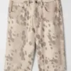 beige paint splatter denim shorts