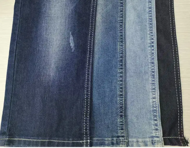 Premium acetate blended denim featuring a silky texture and elegant drape for high-end fashion garment manufacturing.