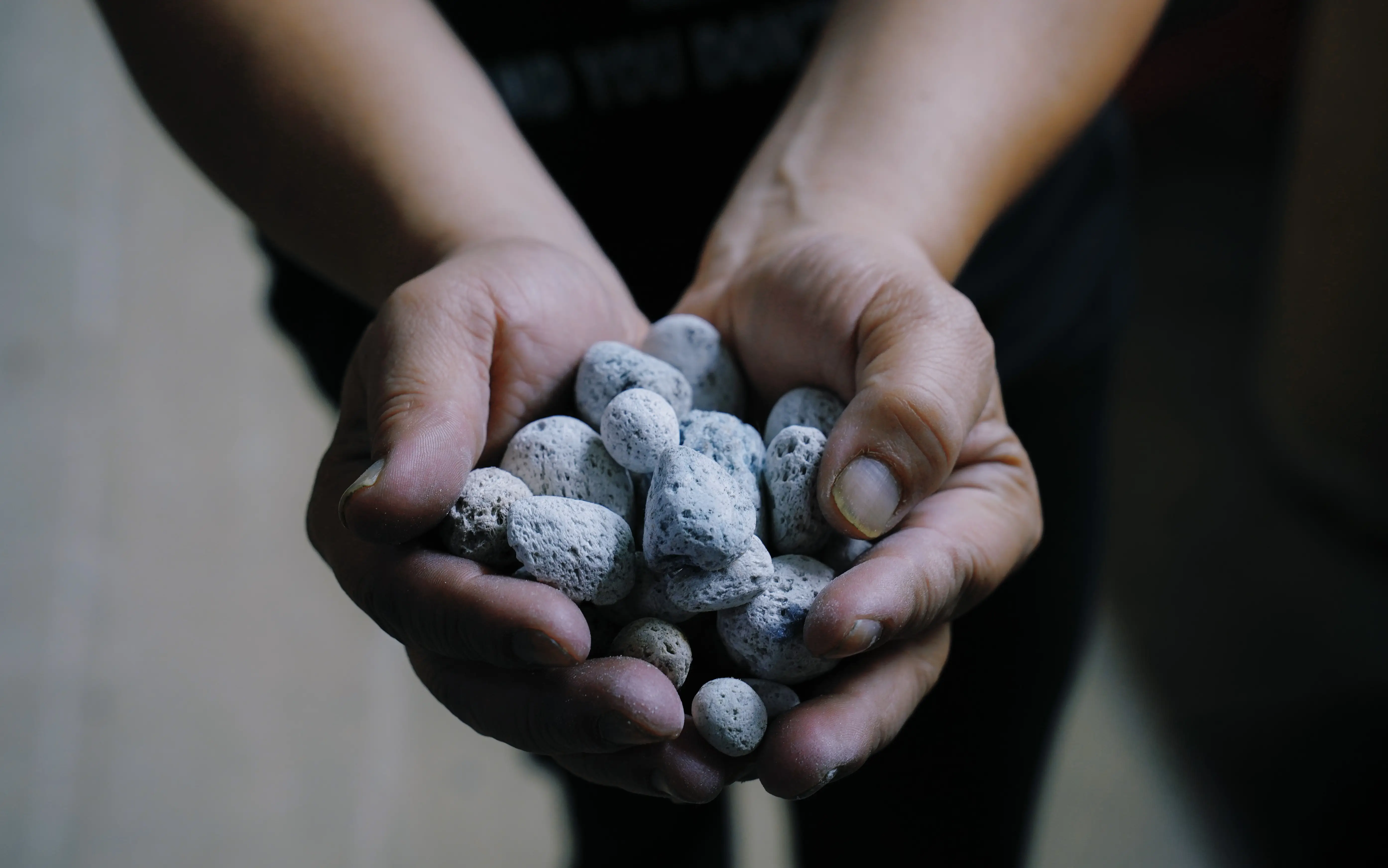 denim fabric weight - pumice stones used for denim stone washing process