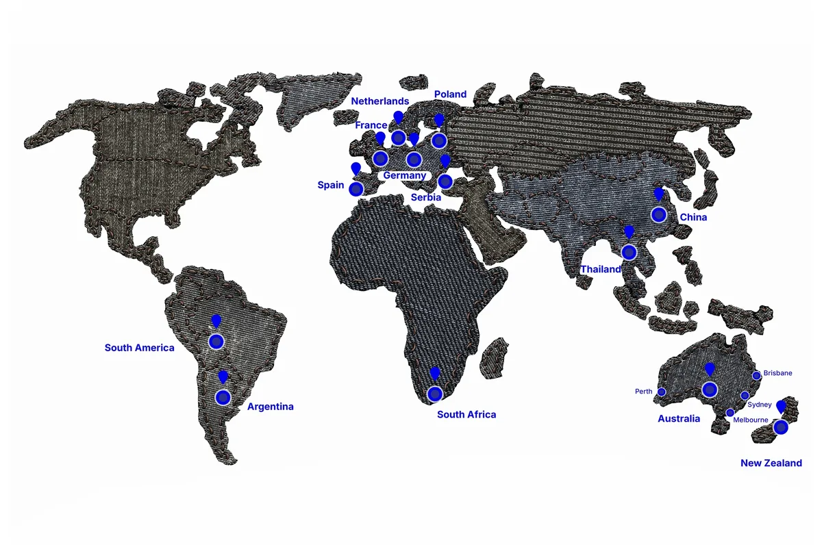 World map showing global distribution and cotton sourcing regions including USA, Peru, Egypt, and Caribbean for premium denim brands
