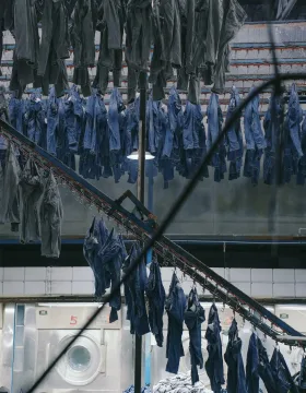 raw denim vs washed denim - washed denim garments after industrial laundry process